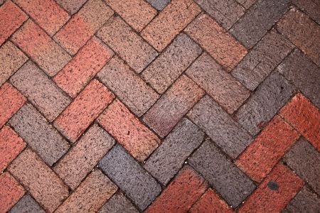How does professional paver sealing protect your patio from weather damage